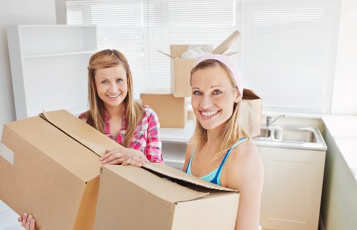 Organised furniture storage space with wrapped household items in Richmond upon Thames
