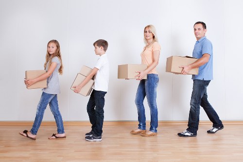 Packed boxes and study materials prepared for student storage in Richmond upon Thames